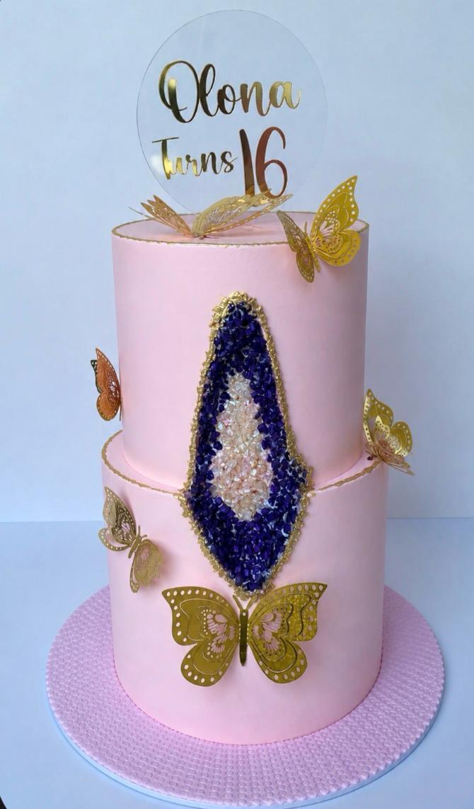 Kiddies two-tier pink cake with butterflies
